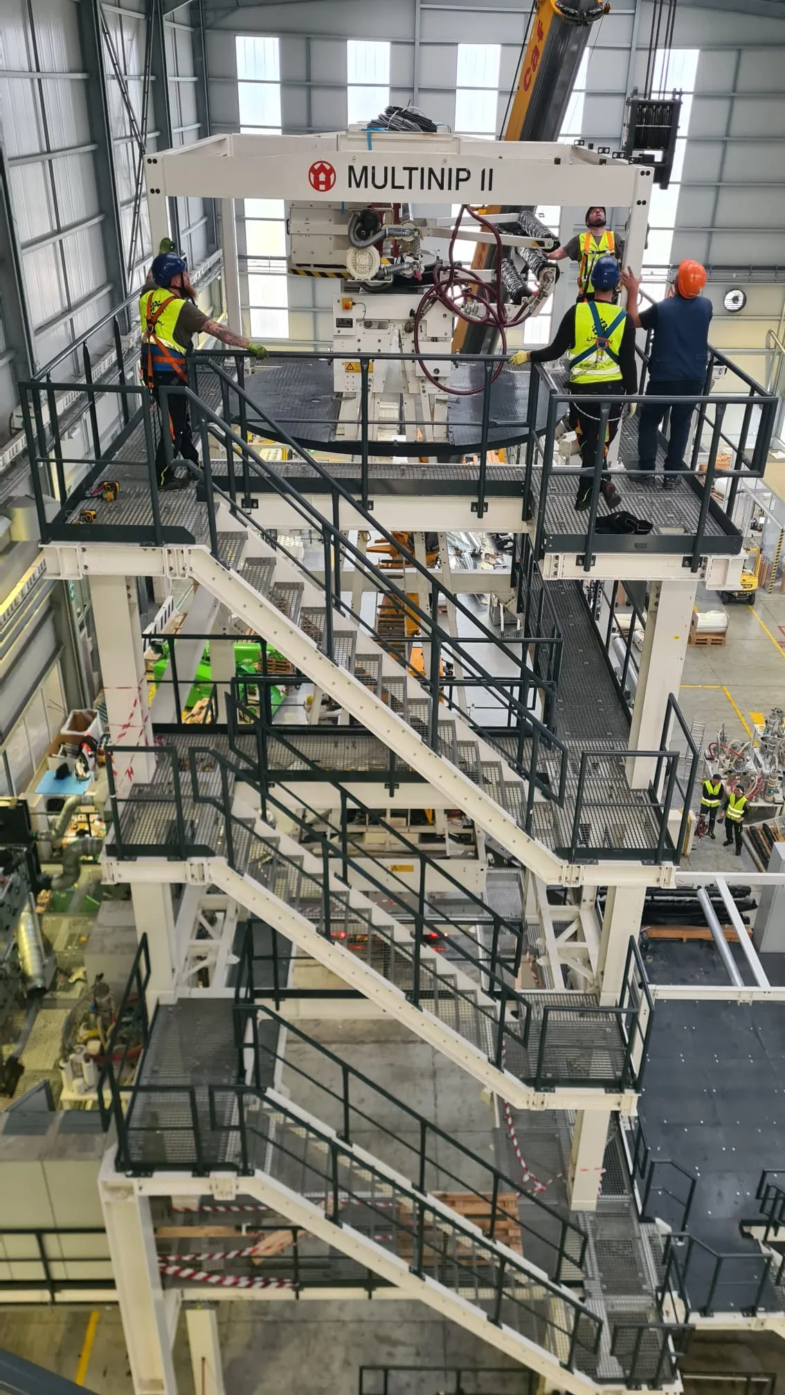 MULTINIP II machine installed on a multi-level steel structure