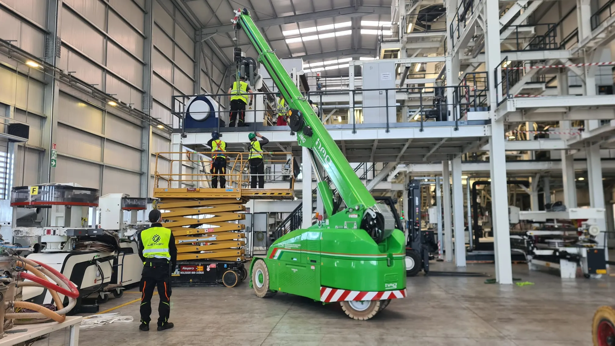 Indoor crane and scissor lift installing equipment at height